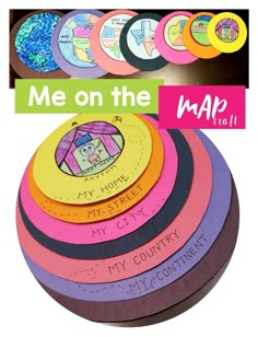 a pile of different colored paper discs with the words me on the map in it