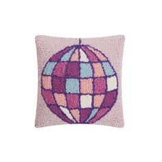 a pink pillow with a multicolored ball on the front and back of it