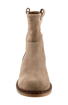 Side pull-tabs offer easy entry on a supple suede bootie grounded by a cushioned footbed and low block heel. 1 1/4" heel 6 1/2" shaft Pull-on style Cushioned footbed with arch support Leather upper and lining/rubber sole Made in Turkey Suede Chelsea Boots With Heel Pull Tab, Suede Boots With Heel Tab And Almond Toe, Suede Ankle Moto Boots With Suede Lining, Suede Ankle Boots With Medium Width, Suede Ankle-high Boots With Heel Tab, Suede Chelsea Boots With Reinforced Heel And Medium Width, Suede Medium Width Ankle Heeled Boots, Suede Ankle Boots With Heel Tab, Suede Ankle Boots Medium Width