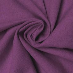 a close up view of the fabric on a purple shirting material that is very soft