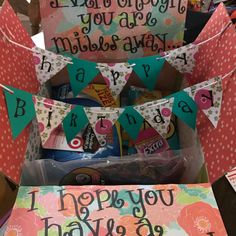 an open box filled with lots of birthday cards