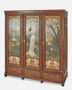 an ornately decorated armoire with paintings on the front and side panels, in wood