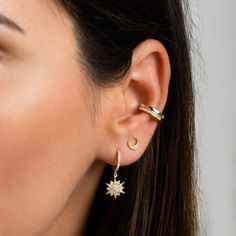 "Pavé huggie hoops with a dainty north star charm. Beautiful and delicate, these tiny hoops are total stunners on their own but also looks gorgeous layered up with other minimal earrings. ∙ Sold individually (1 hoop) or by pair (2 hoops) * D E T A I L S * ∙ Material: .925 Sterling Silver or 18K Gold Plated over .925 Sterling Silver ∙ Stone: White Zirconia ∙ Dimensions: Hoop diameter: 11mm // Star charm: 11mm ∙ Hypoallergenic & nickel-free * P A C K A G I N G * ∙ All jewelry is sent out beaut Celestial Style Everyday Earrings, Yellow Gold Star Huggie Earrings, Celestial Single Earring For Everyday Wear, Celestial Hoop Jewelry Tarnish Resistant, Huggie Earrings With Star Charm, Gold Plated Star Hoop Earrings Tarnish Resistant, Gold Plated Star Hoop Earrings, Star-shaped Tarnish Resistant Hoop Earrings For Everyday, Gold Plated Star Shaped Single Earring