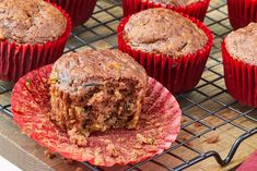 a muffin on a cooling rack with other muffins in the background