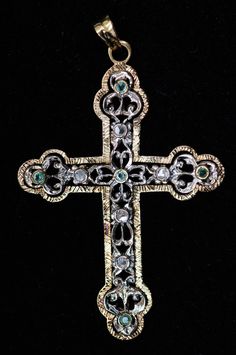 "Antique 18K Yellow Gold & Sterling Cross Pendant with Emeralds & Rose Cut Diamond Accents Cross measures approx. 2 5/8\" tall x 1 5/8\" wide Weight: 10 grams This is a good sized pendant with lots of gorgeous detailing. It is pre-owned, in Good Condition. (B9510)" Angel Wings Art, Diamond Cat, Cross Wallpaper, Gold Baroque, Wings Art, Historical Jewellery, Diamond Cross Pendants, Diamond Cross, Cross Jewelry