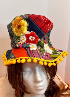 This hat is made sustainably, it is crafted from some vintage clothing and table linens.   The hat is patchwork and it is embellished with an appliqué on the front. Great costume piece or just to wear at that next festival. the hat measures 21 inches Sea Character, Bohemian Hat, Top Hat Costume, Patchwork Bucket Hat, Rave Hats, Hippie Hat, Canvas Hat, Colorful Hat, Safari Hat