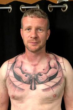 a man with a tattoo on his chest