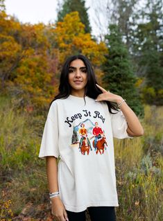 This is the raddest graphic we sell. Rock this American-made high quality outdoorsy tee with a vintage vibe! Featuring a horse riding duo, you'll look ready to keep it rad with some serious style. 100% cotton fabric will keep you comfortable on the go - yee-haw!☀️🐴 FITUnisex fit. Normal size for loose fit, size up for extra baggy Model 5'8 wearing large ☀️100% USA made Cotton, best quality tee we have ☀️Wash cold and hang dry or tumble dry low ☀️Vintage Garment Dyed Fabric Yee Haw, Trendy Graphic Tees, Vintage Vibe, Dyed Fabric, A Horse, Comfy Tees, Horse Riding, American Made, Vintage Tees