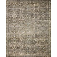 an antique style rug in grey and beige tones