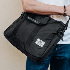 *  Slim, minimalist design  
 *  Removable shoulder strap  
 *  Padded compartment for laptop and tablet  
 *  Zippered front pocket Black Laptop Bag, Lewis Black, Lazy Bear, Black Laptop, Leather Laptop Bag, Welcome To The Family, Jewelry For Men, Leather Laptop, Black Faux Leather