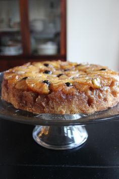 a cake sitting on top of a glass plate