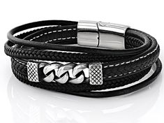 Introducing the Black Faux Leather & Stainless Steel Bracelet from our Artisan Collection! This sleek and stylish bracelet is perfect for adding a touch of edgy sophistication to any outfit. The combination of black faux leather and stainless steel creates a bold contrast that will surely make you stand out in style. With dimensions measuring 8.50 inches long by 1.14 inches wide, this versatile accessory can be dressed up or down effortlessly - making it a must-have addition to your jewelry coll Edgy Leather Jewelry With Black Band, Edgy Black Leather Band Bracelet, Black Faux Leather Jewelry As Fashion Accessory, Chic Leather Bracelet For Party, Elegant Black Metal Wrap Bracelet, Modern Adjustable Black Wrap Bracelet, Elegant Black Wrap Bracelet, Modern Metal Leather Bracelet With Black Band, Modern Leather Bracelet With Metal Black Band