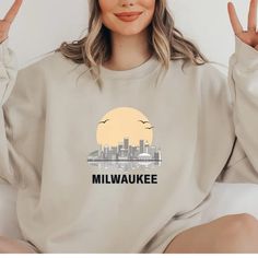 Milwaukee Skyline Sweatshirt Sunset in Wisconsin Sweater - Etsy Milwaukee Skyline, College Sweater, Boy Hoodie, Small Designs, Milwaukee, Stay Warm, Wisconsin, Sweater Sizes, Colorful Shirts