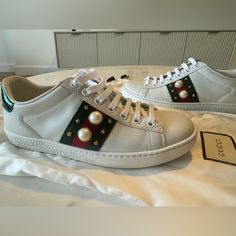 Gucci Sneakers Lightly Used Size 34 Gucci Low-top Sneakers With Abzorb Midsole, Gucci Sneakers With Studded Rubber Outsoles, Gucci Custom Sneakers With Branded Insole And Round Toe, Gucci Custom Sneakers With Round Toe And Branded Insole, Designer Sneakers With Branded Heel Counter, Gucci Custom Sneakers With Round Toe And Laces, White Gucci Slip-on Sneakers, Designer Gucci Custom Sneakers With Round Toe, Shoes Gucci