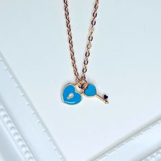 Brand New Handmade Rose Gold Tone Heart Lock And Key Double Charms / Pendants Necklace 0.5in X 0.4in Blue Enamel Heart Lock 0.6in X 0.25in Blue Enamel Heart Key (Available In Red Or Black Enamel. See Separate Listings) 18 Inch Rose Gold Plated Chain Bundle & Save! Cute Blue Necklace For Gift, Dainty Blue Necklace For Her, Blue Necklace For Mother's Day Gift, Blue Heart Pendant Jewelry Gift For Her, Blue Heart Pendant Necklace As Gift For Her, Cute Blue Jewelry With Heart Charm, Cute Blue Jewelry With Heart Beads, Blue Dainty Jewelry For Valentine's Day, Light Blue Jewelry For Valentine's Day Gift