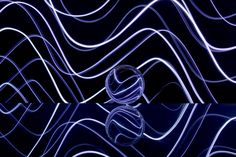 an abstract photo with blue lights in the dark