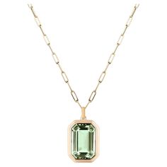 This beautiful Prasiolite Emerald Cut Bezel Set Pendant in 18K Yellow Gold is from our ‘Manhattan’ Collection. Minimalist lines yet bold structures are what our Manhattan Collection is all about. Our pieces represent the famous skyline and cityscapes of New York City which people all over the world dream of seeing. You will be enraptured by our classic, yet flamboyant and colorful pieces…reminding you of the power and sleekness Manhattan can offer. * Gemstone: 100% Earth Mined * Approx. gemstone Emerald Cut Necklace, Fashionable Accessories, Diamond Pendant Sets, Accessories Gold, Diamond Necklace Set, Unique Diamond Rings, Lou Lou, Circle Pendant Necklace, Blue Pendant