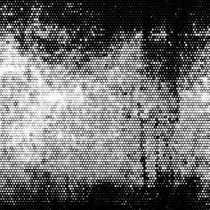 black and white image of an abstract background with dots in the middle, overlaided by smaller circles