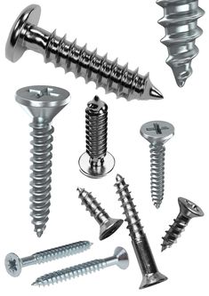 several screws and nails are arranged on a white background