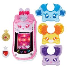 an assortment of toys including a cell phone and other items for children to play with