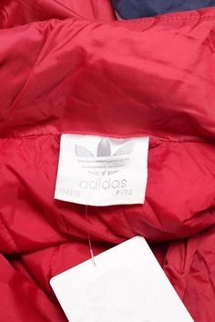 "Vintage 90s Adidas Cut and Saw Quilted Proof Hooded Jacket Big logo Spell Out Color Block Blue/White/Red Size M Condition: Good Measurements: Width (armpit to armpit): 24.5\" Length (shoulder to end of garment): 31\" Please leave me your contact phone number, as the shipping company always need the phone number to help to deliver. Please keep in mind that colors from the pictures may vary because of your screen. I SEND WITH TRACKING NUMBER! If any item is lost or damaged in transit I will make Winter Long Sleeve Outerwear With Logo, Hooded Logo Outerwear For Streetwear, Hooded Winter Outerwear With Logo Patch, Casual Windbreaker With Embroidered Logo For Winter, Casual Red Outerwear With Embroidered Logo, Red Adidas Winter Outerwear, Red Hooded Nylon Windbreaker, Sporty Red Hooded Puffer Jacket, Red Hooded Adidas Outerwear