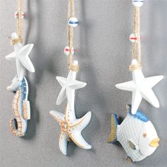 PRICES MAY VARY. BEACH DECOR MATERIAL: Wooden fish beach decoration for home is made of premium wood material and hand painted into rustic color. Great nautical bathroom decor, beach theme decor and coastal theme decor. RUSTIC WALL HANGING ORNAMENT- Star size10*1.2**/35cm; Seahorse size:5*1.2*10/35cm; Fish size:9*1.2*9*35cm. The craft has a hanging rope,can be hanging on the wall. Hand carved wood fish is perfect for entryway decor MUTI-FUNCTIONAL: Mediterranean-style nautical decoration is suit Nautical Kitchen Decor, Nautical Themed Bedroom, Seahorse Decor, Kids Toy Kitchen, Nautical Kitchen, Beach Theme Living Room, Nautical Theme Decor, Nautical Themed Party, Rustic Wall Hangings