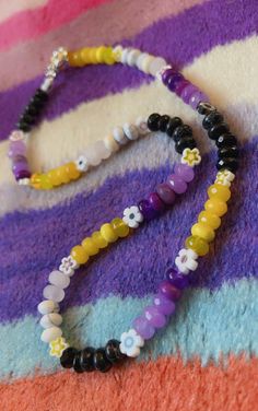 Nobi Gemstone necklace, Yellow, White, Purple, Black /  Custom design / Sailor Clasp - Non Binary all inclusive Jewellery. Little Millefiore flowers I can remove if desired 💫 Made to site just on the collar bone, let me know if you prefer a different length.  🌻Please do not immerse in water or spray with perfume 🌻 Handmade Black Beads For Crafting, Purple Beaded Necklace With Black Beads For Gift, Purple Necklace With Black Beads For Gift, Purple Necklace With Black Beads, Gift Purple Necklace With Black Beads, Adjustable Purple Necklace With Black Beads, Bestie Necklace, Lavender Stone, Noir Design