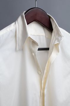 A handmade bespoke shirt cut from a beautiful 4-season Sea Island cotton, with a point collar, hidden-placket front and french cuffs. We call it the "crossover shirt" because it can be worn for black tie (with a tuxedo), for business (with a suit) and for smart casual (with a jacket). Ivory Tuxedo, Bespoke Shirts, Handmade Shirts, White Tuxedo, Bespoke Suit, Sea Island, Tuxedo Shirts, Ivory Wedding Dress, Suit Shirts