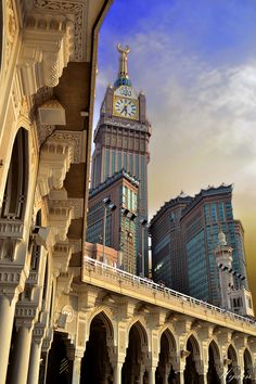 a large clock tower towering over a city