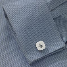 Highly polished and plated in genuine rhodium, these classic cuff links feature a Masonic emblem, accented with blue enamel.Each measures ⅝ x ⅝ x ¾"Plated base metalClean with polishing clothJewelry Closure: Toggle ClaspMetal Color: Silver ToneBase Material: 100% BrassCare: Spot Clean, Wipe CleanMetal: BrassCountry of Origin: Made in US Classic Blue Jewelry For Business, Classic White Jewelry For Business, Classic Blue Cufflinks For Formal Occasions, Timeless White Cufflinks For Business, Classic Blue Cufflinks With Polished Finish, Classic White Gold Cufflinks For Business, Business White Gold Cuff Jewelry, White Gold Cuff Jewelry For Business, Classic Silver Cufflinks For Business