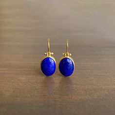 Striking blue Afghanistan lapis lazuli cabochons rest serenely within pristine gold bezels to make an effortlessly regal pairing. 18k yellow gold Lapis lazuli, 9.4ctw, 9mm x 13mm (3/8" x 1/2") Earrings hang 15/16" from the ear Each earring weighs 2.4g Lapis Earrings, Lapis Lazuli Jewelry, Lapis Lazuli Earrings, Kahlil Gibran, Newport Rhode Island, 2 Earrings, Fancy Jewellery, Creative Jewelry, Jewellery Design