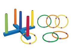 a set of colorful rings and sticks on a white background