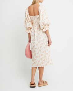 Price Comparison Few Moda $69 Reformation $250 LPA $288 Product Details We love the ethereal silhouette of this breezy, cotton dress. Done with exaggerated puff sleeves and a smocked bodice.- Optional off-the-shoulder sleeves- Midi length- Content: 100% Cotton Style# T21WDR00111 Fit Notes - Model wearing a size XS- Model measurements: 5'10.5'' Height / 32'' Bust / 25.5'' Waist / 34.5'' Hips Size Length Bust Waist Hips XS 112.5 56 - 66 56 - 66 110 - 120 S 114 60 - 70 60 - 70 114 - 124 M 115.5 64 Cotton Midi Dress With Gathered Sleeves For Garden Party, Summer Dresses With Gathered Lantern Sleeves, Spring Cotton Puff Sleeve Dress With Lantern Sleeves, Spring Floral Print Puff Sleeve Dress With Billowy Fit, Cotton Puff Sleeve Dress For Brunch, Feminine Voluminous Dresses With Puff Sleeves, Spring Pink Smocked Dress With Gathered Sleeves, Pink Smocked Puff Sleeve Dress, Pink Smocked Dress With Gathered Sleeves For Spring