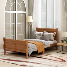 a bed room with a neatly made bed next to a window and a rug on the floor