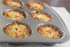 a muffin tin filled with lots of food