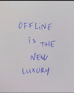 a piece of paper with writing on it that says offline is the new luxury