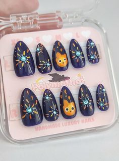 Hayao Miyazaki Nail Art, Book Nail Art Designs, Simple October Nail Designs, Pastel Space Nails, Fandom Nail Art, Calcifer Nail Art, Hand Paint Nail Art, Sorcerer Mickey Nails, Nerd Nail Art