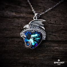 925 Silver Dragon guards a blue crystal heart necklace. – Epic Loot Shop Magical Blue Pendant Jewelry, Blue Mystical Pendant Jewelry, Mystical Blue Pendant Jewelry, Blue Spiritual Heart Pendant Jewelry, Spiritual Blue Heart Pendant Jewelry, Spiritual Blue Heart Pendant Necklace, Mystical Blue Sterling Silver Necklace, Blue Crystals Stones, Thor's Hammer Necklace