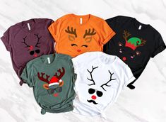 "Cute Reindeer Winter Shirt, Christmas Family Matching Shirt, Christmas Group Shirts, Deer Face Shirt, Funny Christmas Shirts, Winter Women 📢Please Check All Photos For Details. 📢Choose Your T-Shirt Size From The Drop-Down Lists Next To The item Picture   📢Choose Of Your T-Shirt Color From The 2nd Picture   📢Use \"Add message to Seller\" link On The Checkout Page To Send me the Following important Details For Your Order's Customization.   📢Shipping Time Varies by location (we are located in Deer Face, Funny Reindeer, Deer Shirt, Reindeer Shirt, Reindeer Face, Cute Deer, Cute Reindeer, Shirts Cute, Kids Holiday