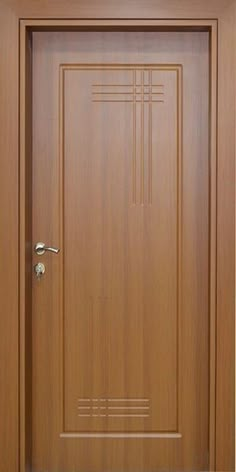 a wooden door with an ornamental design on the front and side panels, as well as a keyhole