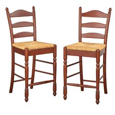 two wooden chairs side by side with one chair up against it's back and the other in front