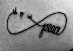 a tattoo with the word peace on it