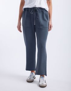 DESCRIPTION Ultra comfortable and oh-so-stylish, you'll love the Raw Edge Lounge Pant from White & Co. Crafted from super soft un-brushed French Terry, these lounge pants are an everyday must-have! These stylish pants feature an elastic waistband, relaxed straight-leg silhouette, front patch pockets and back jet pockets. Considered details like the matching drawcord, top stitch detail colour pop bar tack detail and raw finished hem elevate these weekend essentials. Still browsing? Discover our full range of women's clothing or explore our collection of women's pants. FEATURES & FIT Elastic waistband Matching drawcord with orange bar tack Straight leg silhouette Ankle length Front patch pockets with top stitch detail Back welt jet pockets Designed in Australia True to size Fit: Model is usu Soft-washed Bottoms For Everyday Fall Wear, Casual Soft-washed Bottoms For Lounging, Soft-washed Everyday Bottoms For Fall, Casual Soft-washed Lounging Bottoms, Soft-washed Wide Leg Loungewear Pants, Soft-washed Pants For Fall Loungewear, Soft-washed Loungewear Pants For Fall, Fall Loungewear Soft-washed Pants, Super Soft Casual Bottoms With Relaxed Fit