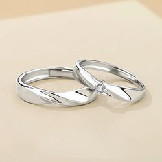 Our Matching Engravable Matching Swirl Wedding Rings for Two is an open ended/adjustable size anti-allergic jewelry set. Personalize the rings with names or any text of your choice in local languages and unique symbols to make it a romantic Christmas and Valentines gift for men and women. Material: White Gold Plated 92 Adjustable Engraved Ring For Wedding On Valentine's Day, Adjustable Engraved Wedding Ring For Valentine's Day, Valentine's Day Wedding Adjustable Engraved Ring, Valentine's Day Wedding Couple Open Rings, Wedding Rings For Couples With Open Ring Style, Couples Wedding Rings Open Ring Style, Couples' Open Ring Wedding Rings, Couples' Open Ring For Wedding, White Engraved Open Ring For Wedding