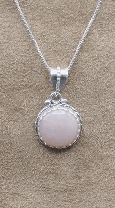 "Pretty Peach Moonstone Pendant  18\" Sterling  Silver Chain included Weight 7 grams Stone:  16 mm Round 30mm x 17mm; 1-1/8\" x 3/4\" Sterling Silver 925, Handmade $65 Exclusively designed by Richard James for richlo jewelry Check out our other fine jewelry at: https://etsy.com/shop/arizonagemstudio A stone for \"new beginnings\", Moonstone is a stone of inner growth and strength. It soothes emotional instability and stress, and stabilizes the emotions, providing calmness." Pink Opal Gemstone Necklace, Sunstone Jewelry With Round Natural Stones, Silver Sunstone Jewelry As A Gift, Silver Sunstone Jewelry For Gift, Richard James, Inner Growth, Green Valley, Peach Moonstone, Moonstone Pendant