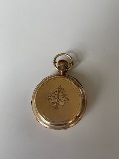 "James Russell 18 Kt gold fancy hunt case pocket watch. Beautifully etched with a scenic house, mountains, and waterwheel on the front cover and a floral design on the back cover. This watch is in excellent condition working well with its 15 jewel key wind and key set movement. The porcelain dial with roman numerals features a sunken seconds dial at the 6 o'clock and is in perfect condition without cracks chips or hairlines. Obviously well cared for the coin edge on the front and back covers sho James Russell, Vintage Omega, Water Wheel, Pocket Watches, Tick Tock, Sentimental Gifts, Roman Numerals, 14kt Gold, White Gold Diamonds