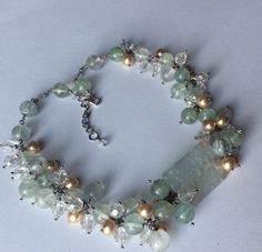 This one of a kind necklace is made with genuine 10 mm green prehnite beads, agate stone  rectangle, (45 x 25 mm), glass beads and silver colored fittings. Necklace is 42 cm (116,6 ) long without chain. Necklace has chain that regulates the length. This necklace is perfect for a formal occasion and wedding! Shipping: Post office service (registered package with tracking number). Shipping usually takes 12-25 days, depending on your location. Thank you for visiting my shop.Wait for you again... Elegant Aventurine Beaded Necklaces With Polished Beads, Elegant Aventurine Beaded Necklace With Polished Beads, Handmade Elegant Aventurine Beaded Necklaces, Elegant Green Agate Crystal Necklace, Elegant Handmade Aventurine Necklaces, Handmade Elegant Aventurine Beaded Necklace, Handmade Elegant Aventurine Necklace, Elegant Handmade Aventurine Necklace, Prehnite Gemstone Beads Necklace For Gift