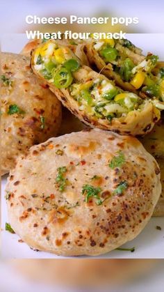 some food on a white plate with the words cheese paneer pops wheat flour snacks