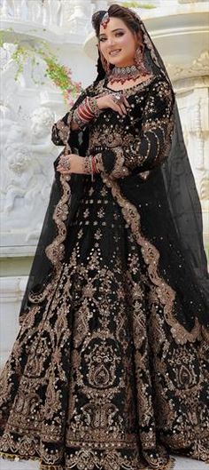 Black and Grey color Lehenga in Velvet fabric with Embroidered, Mirror, Thread, Zari work Black Embroidered Fabric For Wedding, Black Gown With Pallu And Traditional Drape, Black Gown With Pallu In Traditional Drape, Festive Black Gown With Pallu, Black Embroidered Fabric With Zari Work For Wedding, Black Lehenga With Intricate Embroidery For Wedding, Black Embroidered Fabric With Zari Work For Reception, Black Embroidered Dupatta For Reception, Black Semi-stitched Gown With Pallu