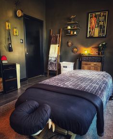 a large bed sitting in a bedroom next to a dresser